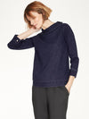 Navy Blue denim sweatshirt in simple shape, with feminine ties at the sleeves and a relaxed funnel neck.