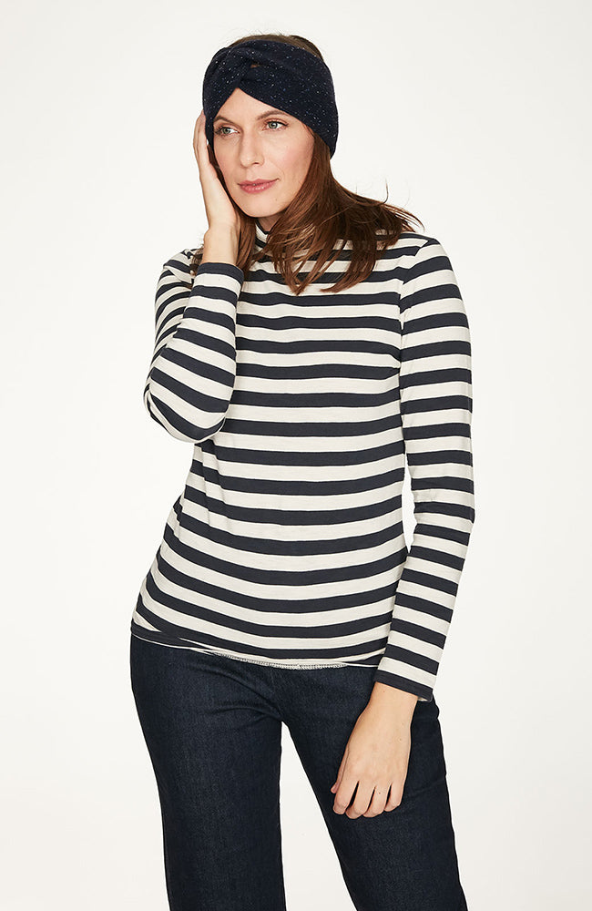 Midnight Navy/White striped roll turtleneck with relaxed, feminine fit and long sleeves. 