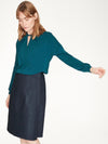 Kingfisher Blue top with twist neck slit detail and long cuffed sleeves.